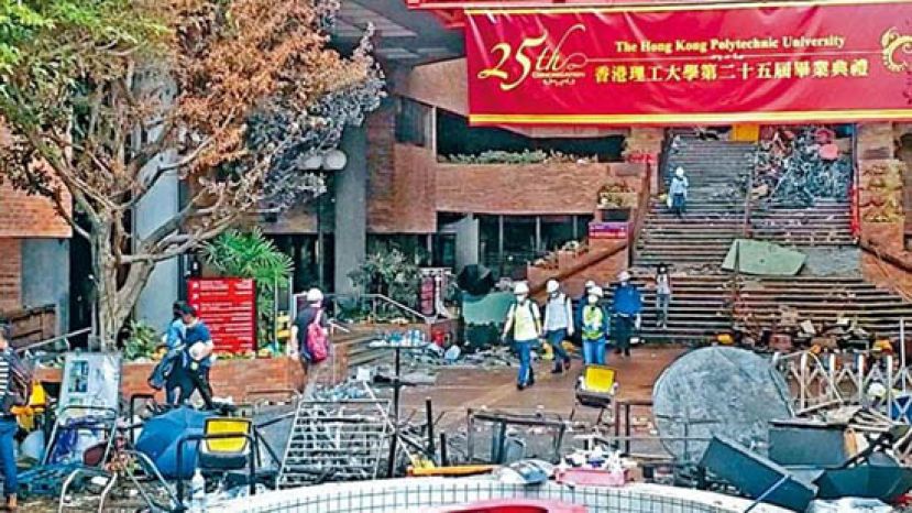 理工大学教职员进入校园，进行善后工作。