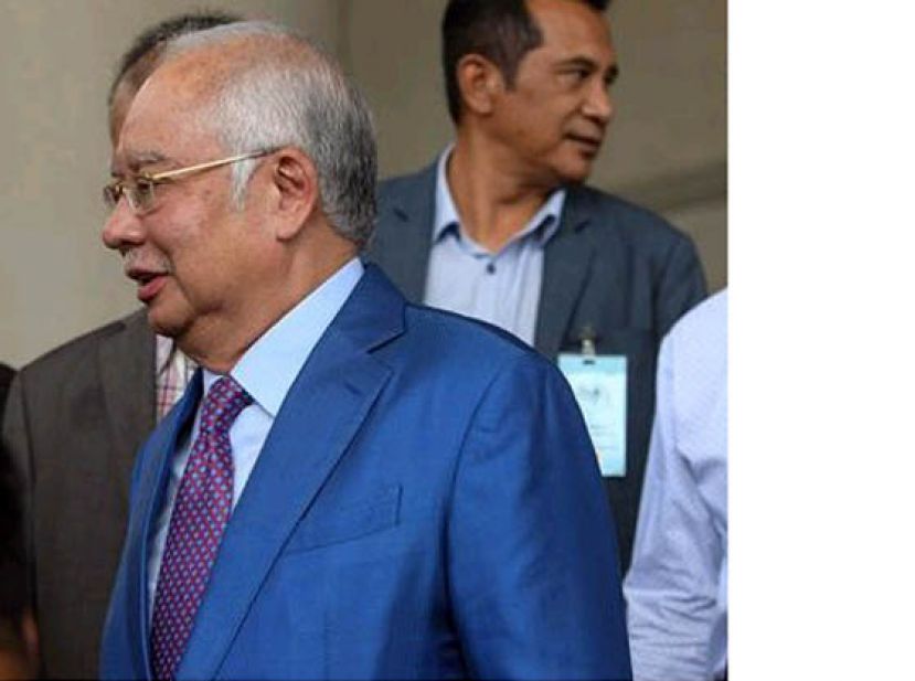 前首相拿督斯里纳吉抵达法庭大厦。
